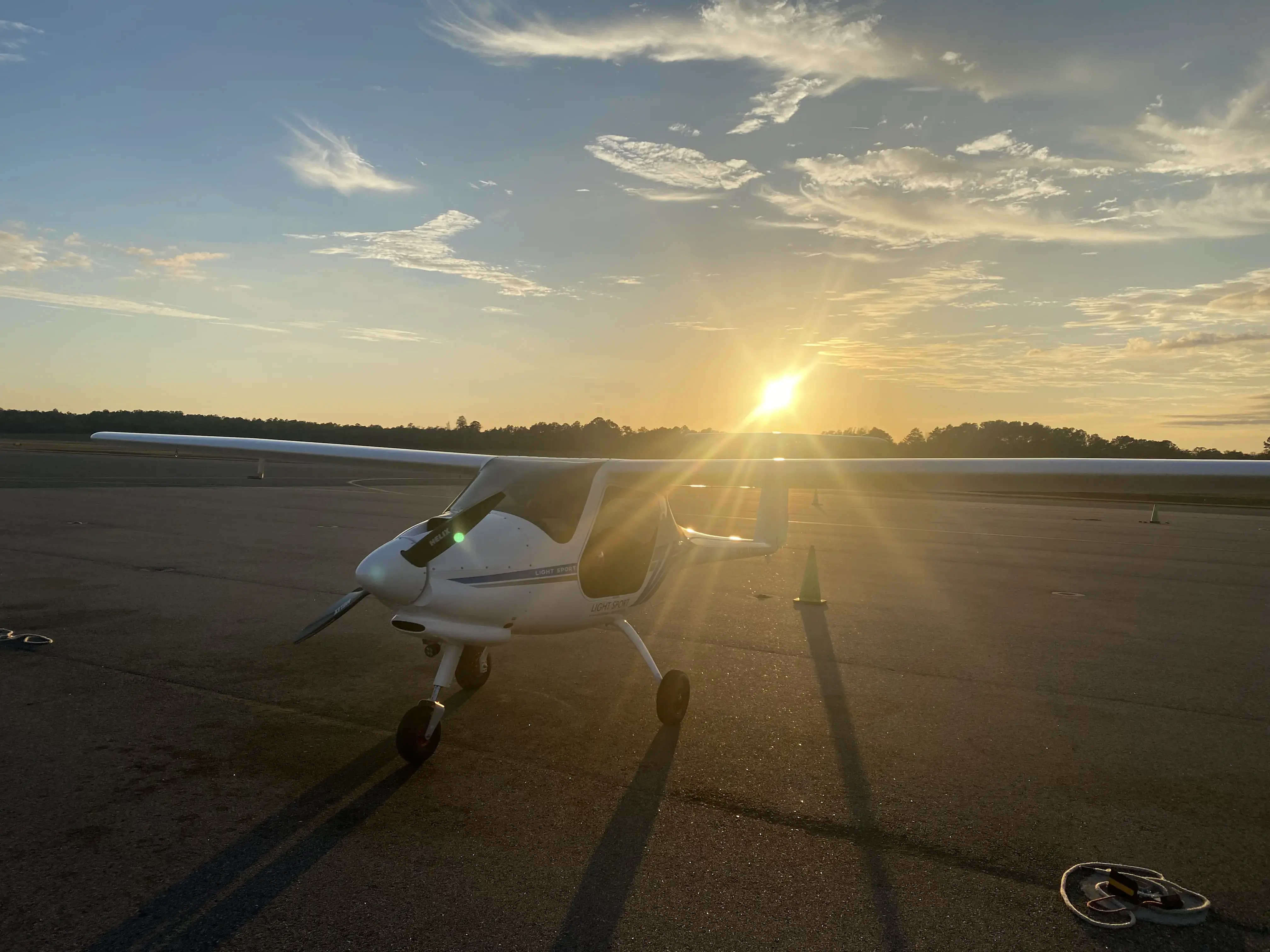 Pipistrel Alpha Trainer with the sun in the background