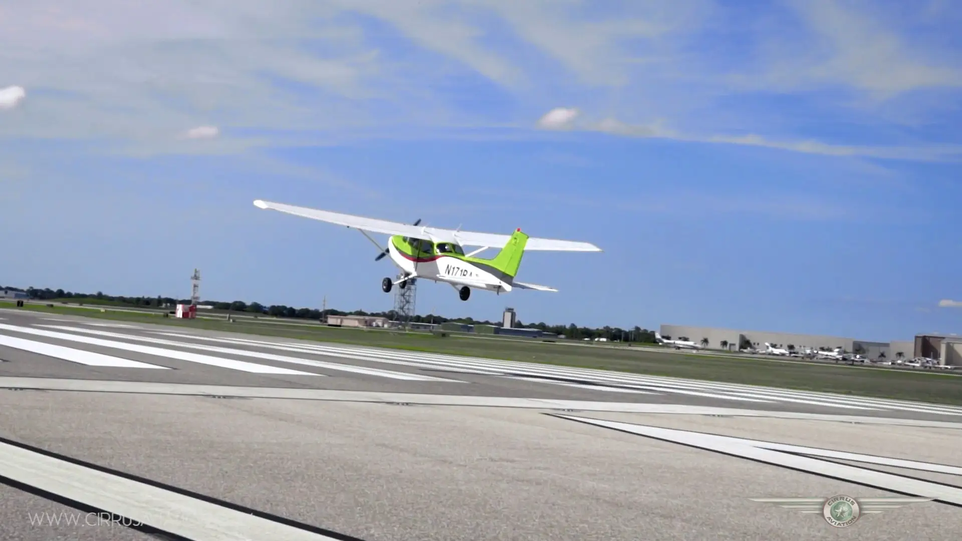 Back view of plane taking off the runway