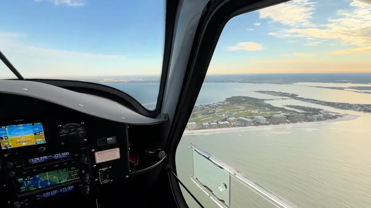 Inside of the cockpit of an airplane with two pilots during flight