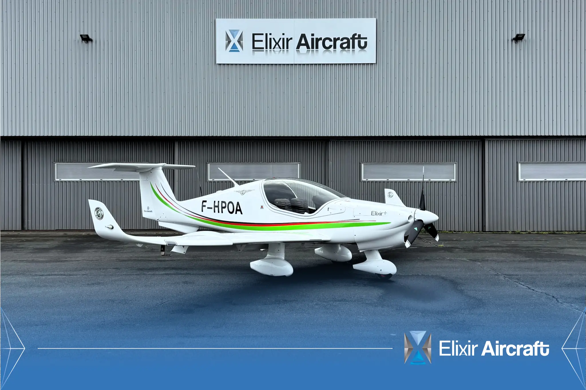 Elixir aircraft F-HPOA parked in front of a hangar with Elixir Aircraft watermark over it