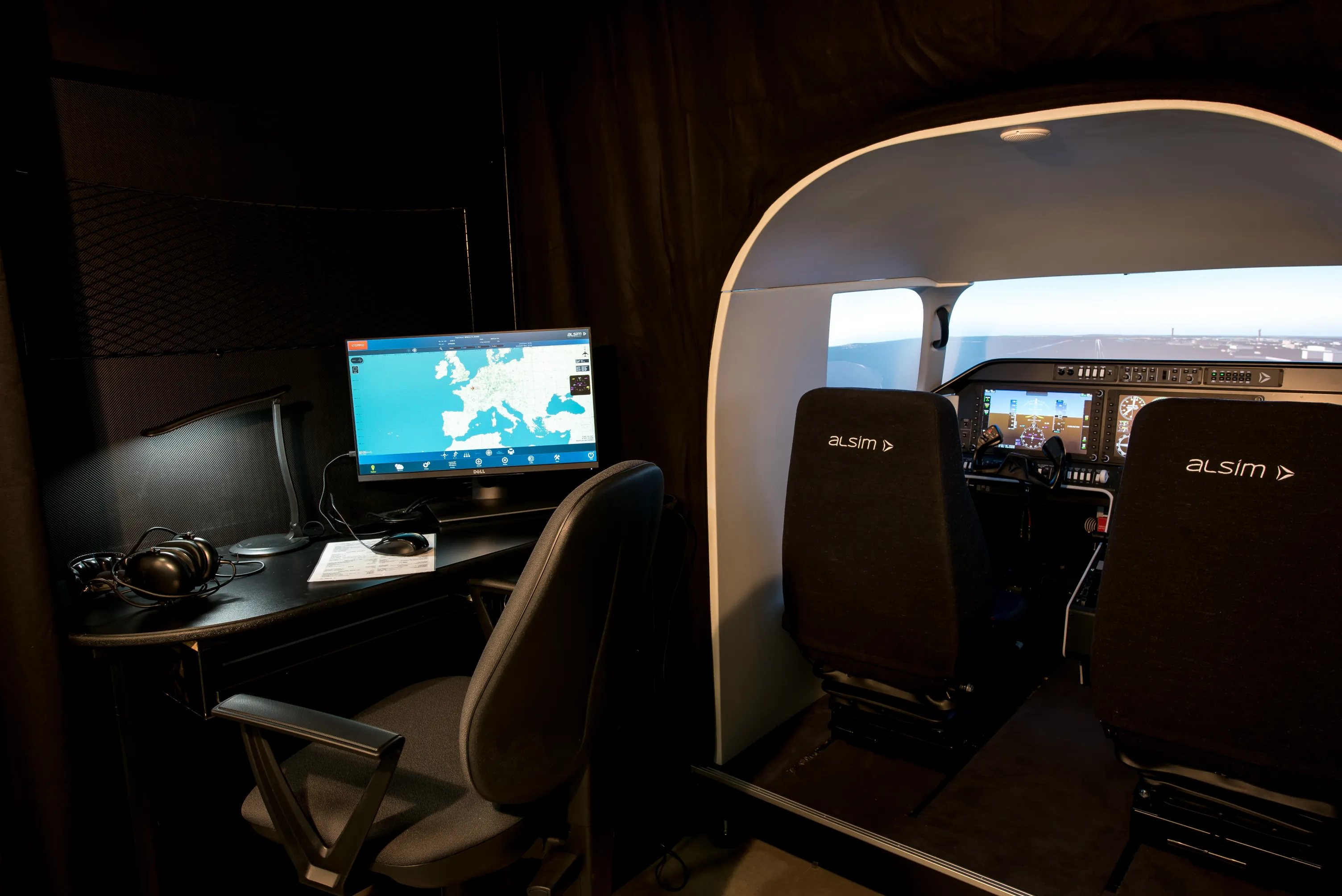 Full view of ALSIM flight simulator from behind