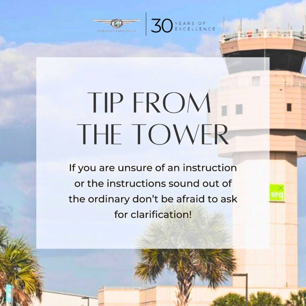 Tip from the tower card with airport command tower in the background